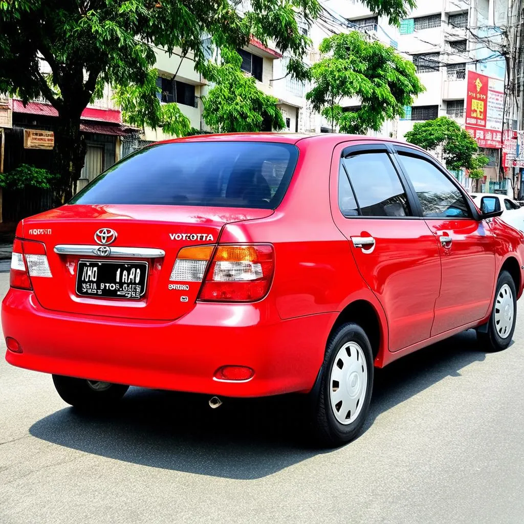 Xe ô tô Toyota Vios đang đỗ trên phố