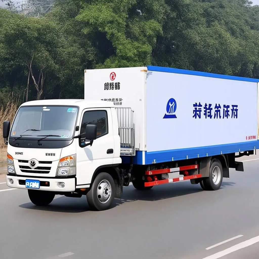 Xe tải 2t4 cũ Dongfeng đang vận chuyển hàng hóa