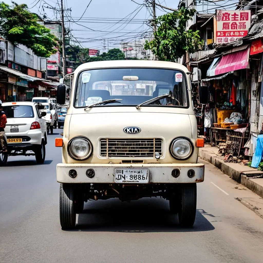 Xe tải Kia 1 tấn cũ chạy trên đường phố