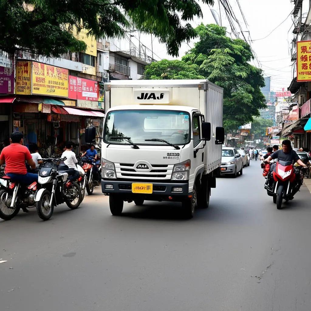 Xe tải nhẹ JAC di chuyển trên đường phố