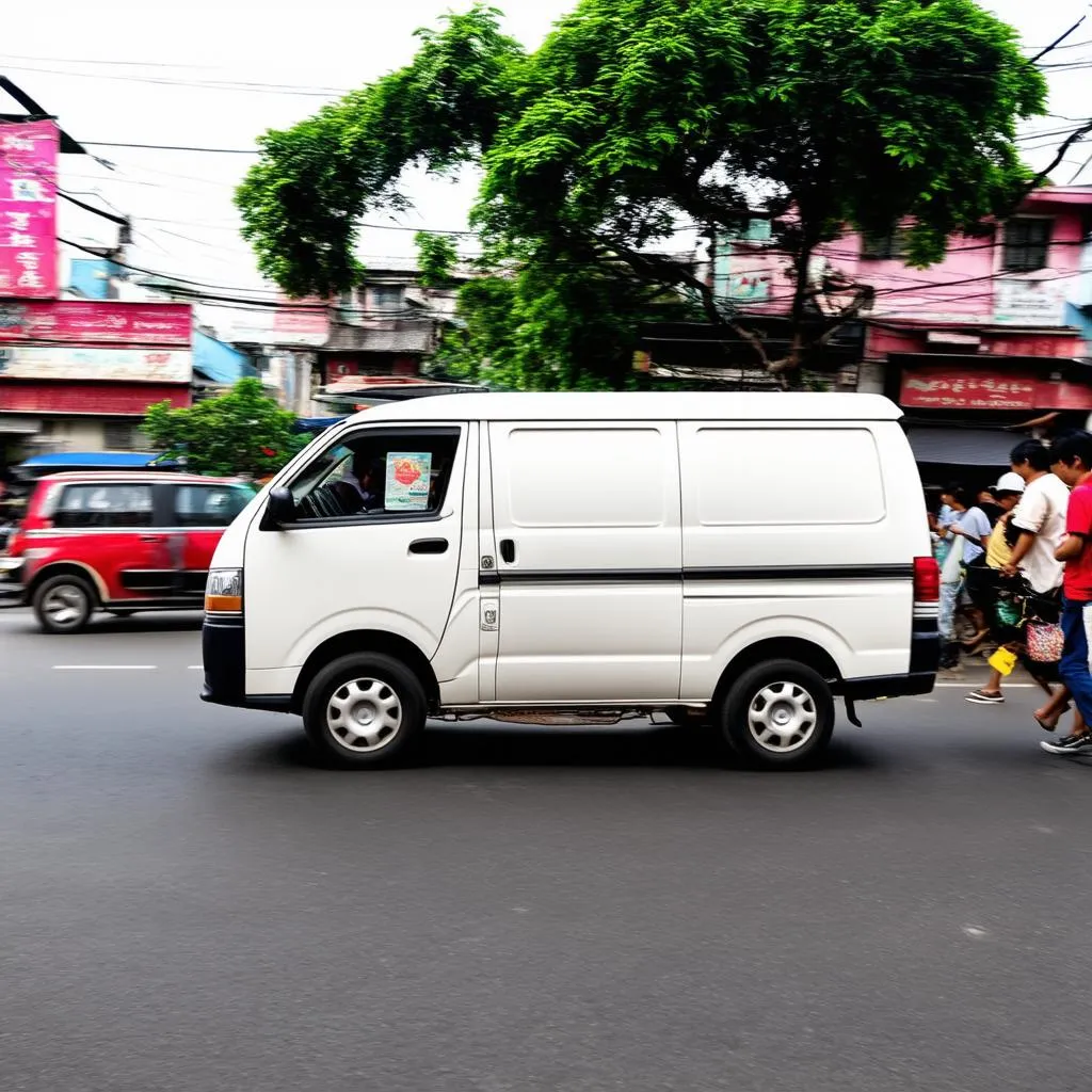 Xe tải van lưu thông trên phố