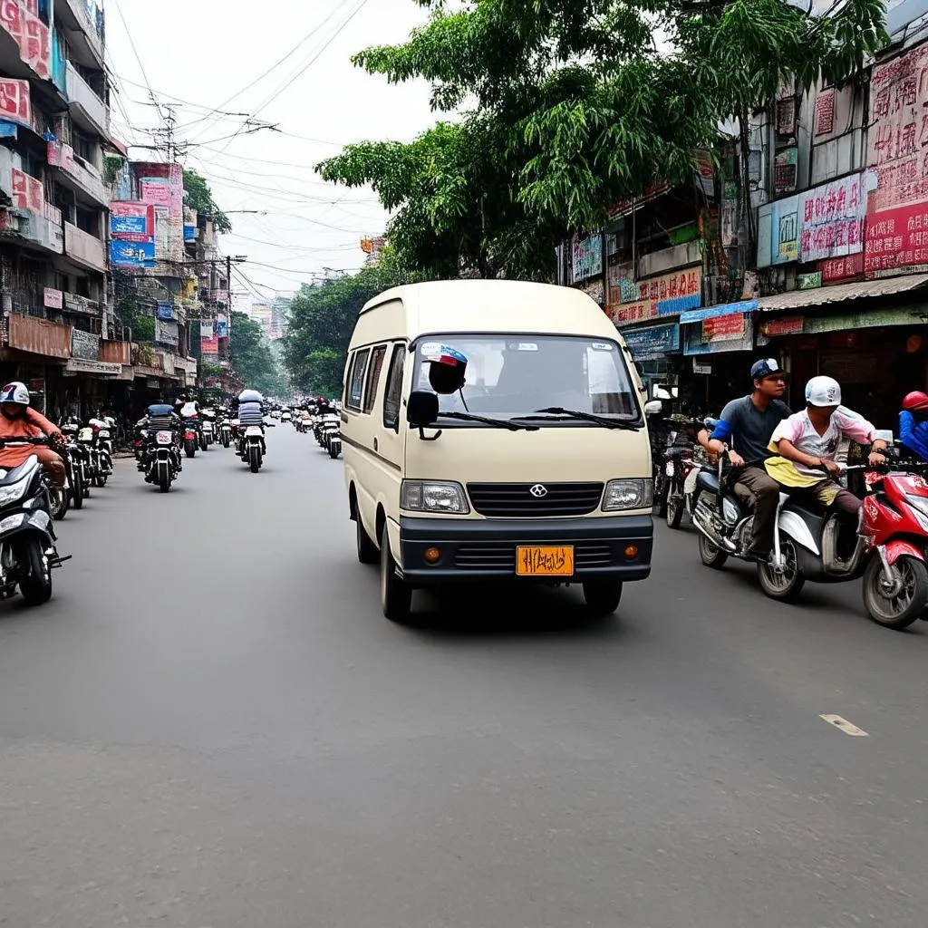 Lái xe tải van trên đường phố Hà Nội