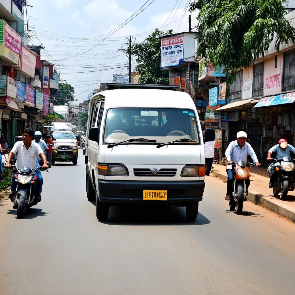 Xe tải van di chuyển trên đường phố Buôn Ma Thuột